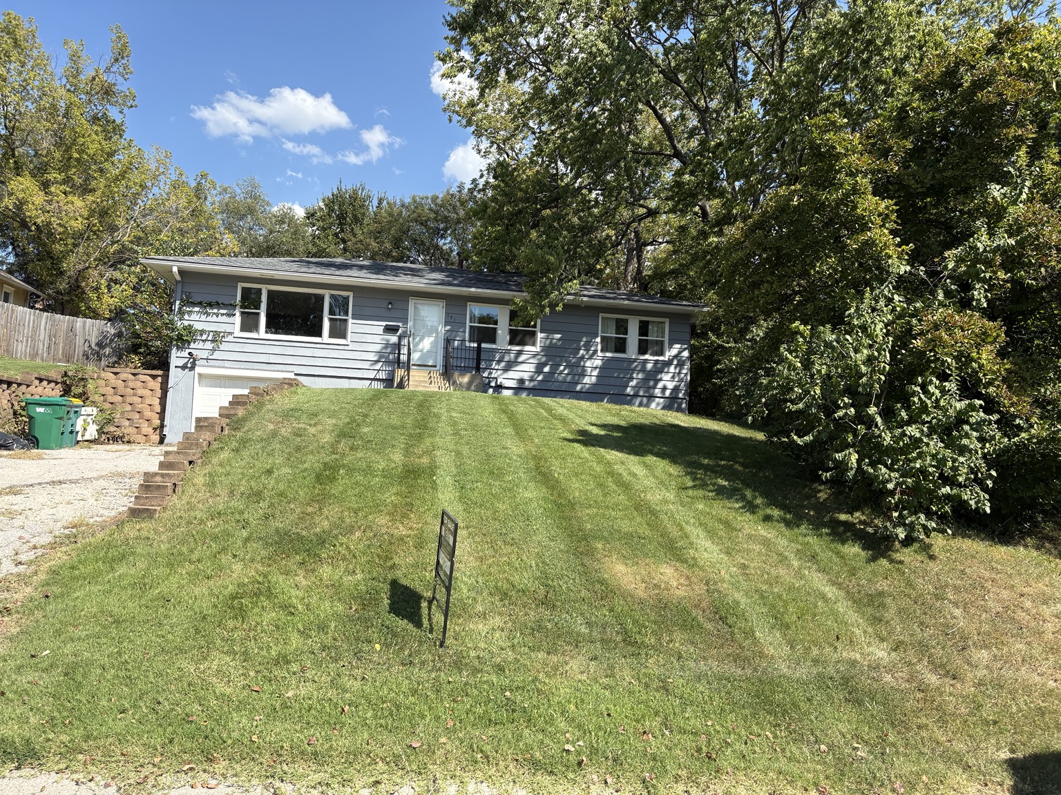 Mowed lawn beside home